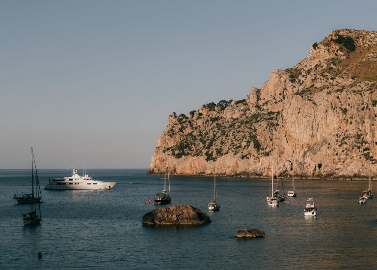 boats sailing on sea