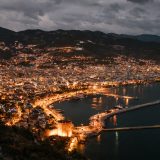 picturesque scenery of coastal town in night illumination