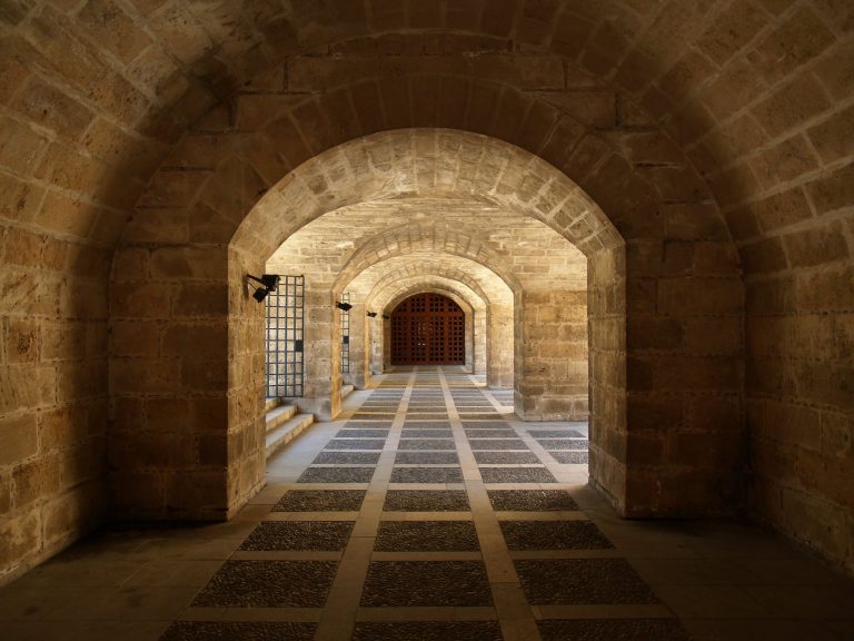 brown and gray brick tunnel