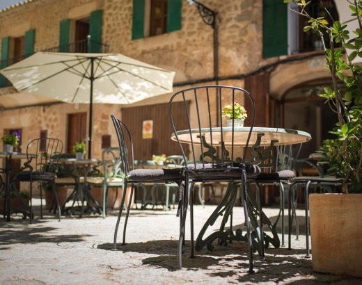 selective focus photography of table and chairs