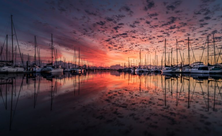 boats clouds dawn dusk